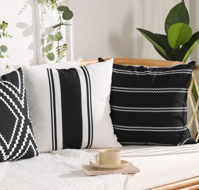 Patio Upgrades That Make a Bigger Difference Than You Think 9 outdoor black and white throw pillows
