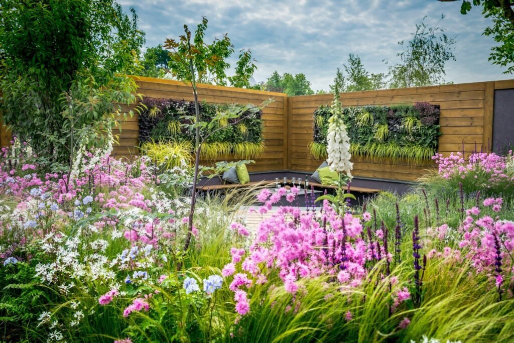 A lush garden with pink and white flowers