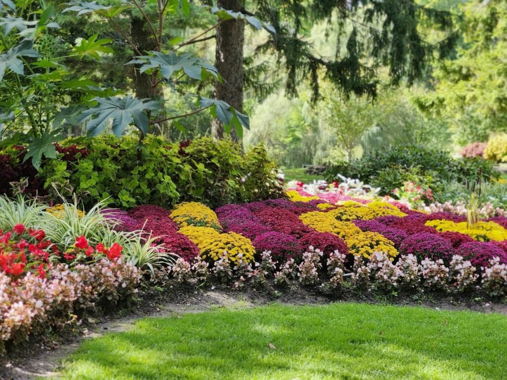 Explore Low-Maintenance Gardening with Perennial Flowerbeds 1 low-maintenance gardening; Colorful garden with lush foliage and blooming flowers in a Toronto park.