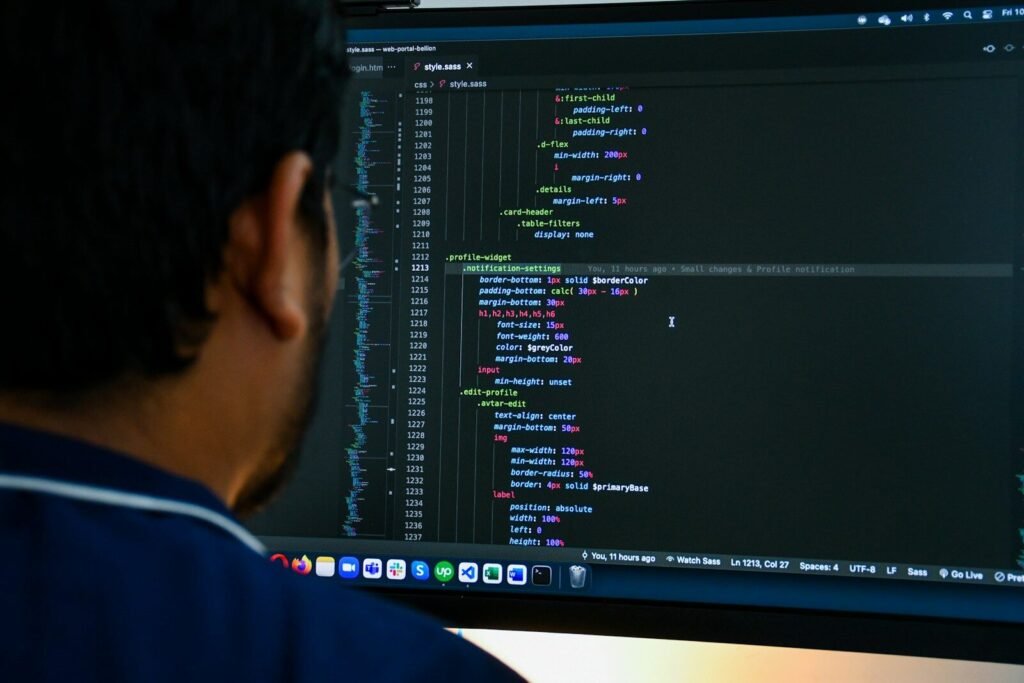 a man looking at a computer screen